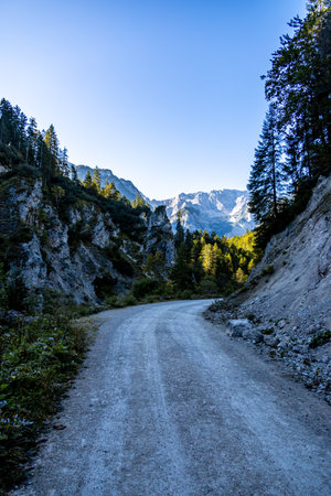 Mountain hike through the beautiful Bavarian Alps just outside Garmisch-Partenkirchen up to the Zugspitze - Bavaria - Germanyの写真素材