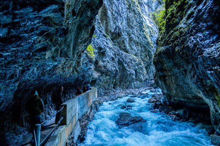 Mountain hike through the beautiful Bavarian Alps just outside Garmisch-Partenkirchen up to the Zugspitze - Bavaria - Germanyの写真素材