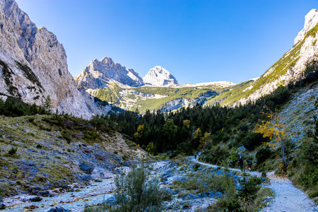 Mountain hike through the beautiful Bavarian Alps just outside Garmisch-Partenkirchen up to the Zugspitze - Bavaria - Germanyの写真素材