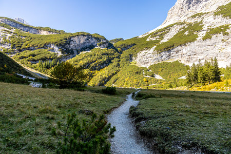Mountain hike through the beautiful Bavarian Alps just outside Garmisch-Partenkirchen up to the Zugspitze - Bavaria - Germanyの写真素材