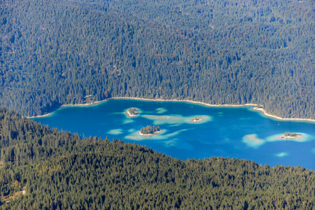 Mountain hike through the beautiful Bavarian Alps just outside Garmisch-Partenkirchen up to the Zugspitze - Bavaria - Germanyの写真素材