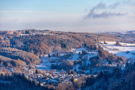 Winter wonderland in the Thuringian Forest on the Neuhoefer Wiese meadow on the Rennsteig trail at sunset - Thuringia - Germanyの写真素材