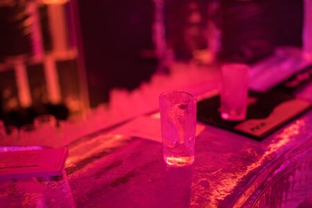 A glass made of ice at an ice bar.の写真素材