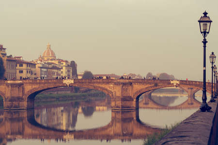 Looking around the river Arno at Trinita bridge.の写真素材