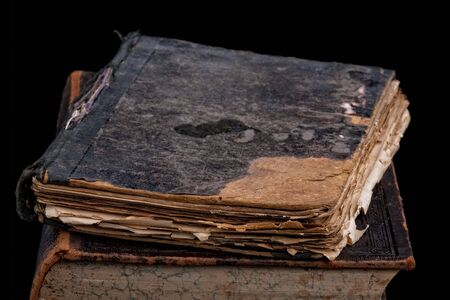 Ancient book on a black backgroundの写真素材