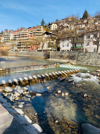 city view in the Italian city of Bressanone through waterfallの写真素材