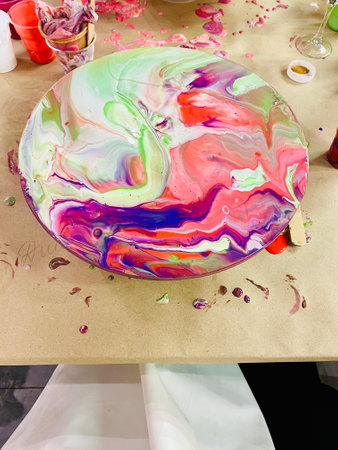 Round green pink painting hand made on art lessonの写真素材