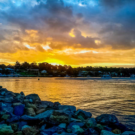 Sunset over beach/bayの写真素材