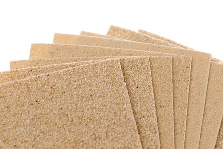set of different sandpapers isolated over white background