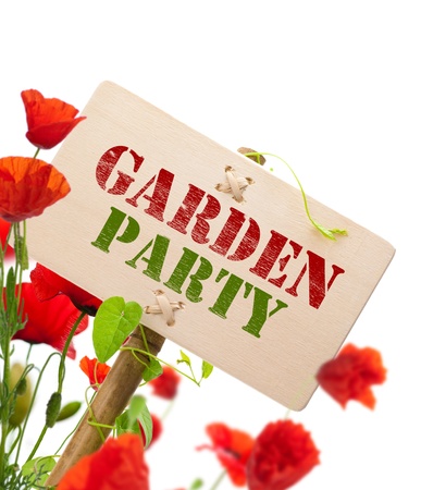 Garden party sign, message on a wooden panel, green plant and poppies - image is isolated on a white backgroundの写真素材