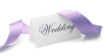 Wedding card and purple ribbon over a white backgroundの写真素材