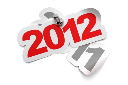 2012 sticker fixed onto 2011 - 3d greeting card over a white background, numbers are fixed with a metal thumbtackの写真素材