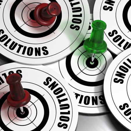 solutions targets green and red pushpinsの写真素材