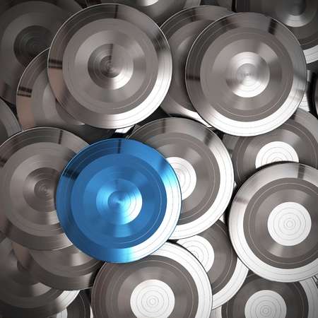 many metallic targets view from front with one unique blue target, background is grey の写真素材