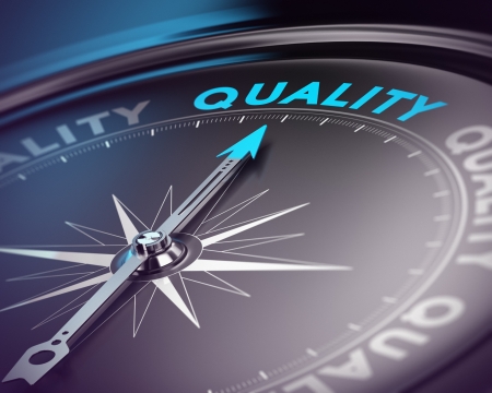 Compass needle pointing the blue text  Blue and black tones with blur effect and focus on the main word  Concept for quality assurance management の写真素材