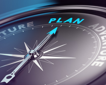 Compass needle pointing the word plan over black background  Concept illustration of travel organizationの写真素材