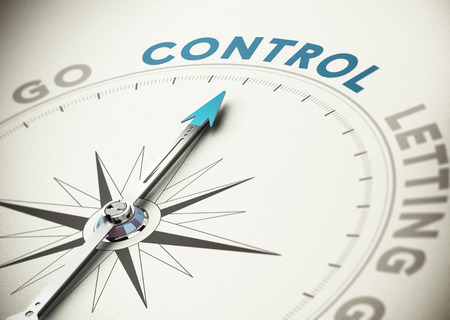 Psychology concept  Compass needle pointing the word control with blue and beige tones の写真素材