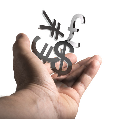 Man hand holding currencies symbols over white background, concept image for illustration of currency exchange service.の写真素材