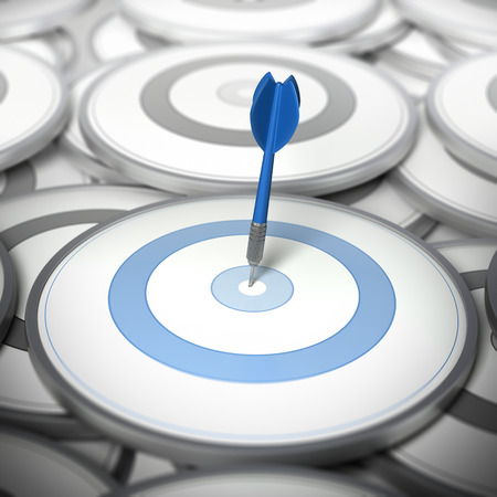 One dart hitting the center of a modern dartboard, targets concept to illustrate Target audience or niche Marketing.の写真素材