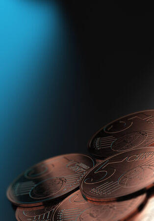 Euros currency, close up 5 cents coins over blue background with blur effectの写真素材