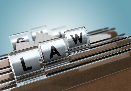 Folder tabs with letters composing the word law, concept image for illustration of justice.の写真素材