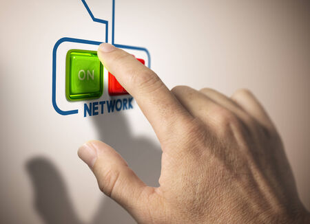 One finger pressing on button. Concept of networking or network activationの写真素材