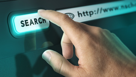 One finger pressing a search engine button, image concept of internet search and interactive terminal.の写真素材