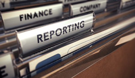 Close up on a file tab with the word reporting, focus on the main text and blur effect. Concept image for illustration of business report.の写真素材