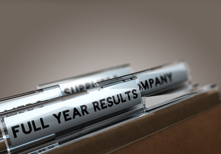 Folder tab with the text full year results with focus on the word and blur effect. Concept image for financial results.の写真素材