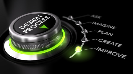 Switch button with green light, black background. Conceptual image for illustration of engineering design process.の写真素材