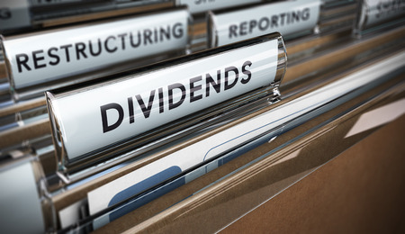 File tab with focus on the word dividends. Conceptual image for illustration of company restructuring plan and dividend.の写真素材