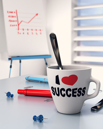 Mug with the text i love success office table and flipchart with diagram. Concept of successful executive.の写真素材