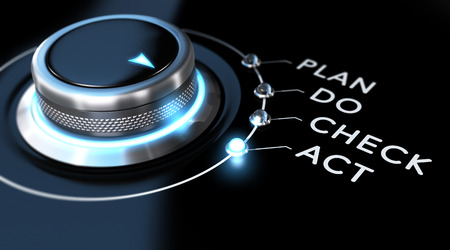 Switch button with blue light, black background. Conceptual image for PDCA illustration or business process improvement.の写真素材