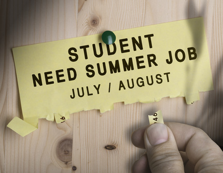 Tear off not with the text student need summer job over wooden backgroundの写真素材