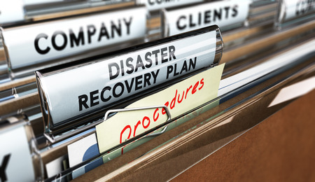 Close up on a file tab with the text Distaster Recovery Plan, focus on the main text and blur effect. Concept image for illustration of DRP ans crisis communication.の写真素材