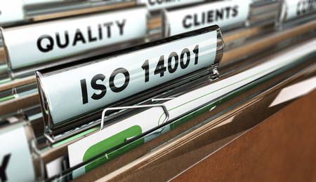 Close up on a file tab with the word ISO 14001, focus on the main text and blur effect. Concept image for illustration of Quality Standardsの写真素材