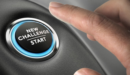 Finger about to press a challenge button. Ambitious man, motivation concept.の写真素材