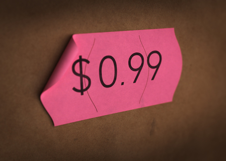 Psychological pricing printed on a pink label. concept image for illustration of prices psychological impact.の写真素材
