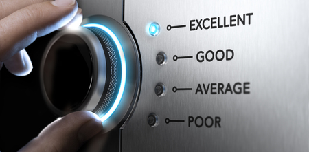 Hand turning a knob to the top position, blue light and blur effect. Concept image for excellent customer service.の写真素材