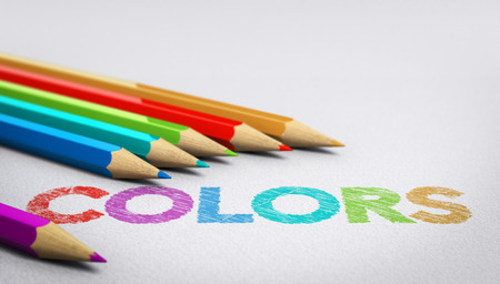 Colors word handwritten on a paper texture with six wooden pencils sourounding it. Concept image for testing color combination or arrangement.の写真素材
