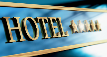 Five stars hotel sign written with golden letters over blue background. Horizontal image suitagle for headerの写真素材