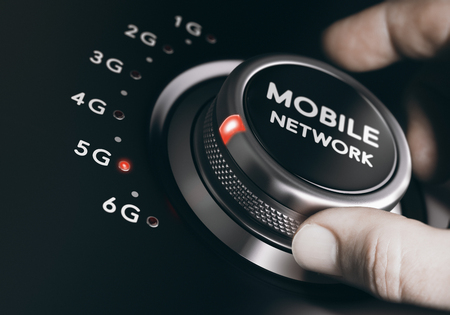 Man turning the mobile network selector button to the next 5G generation. Telecommunication standards concept. Composite between an image and a 3D background.の写真素材