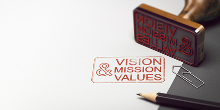 Rubber stamp with other office supplies and the text vision mission and values on a sheet of paper. Company Statement Concept. 3D illustrationの写真素材