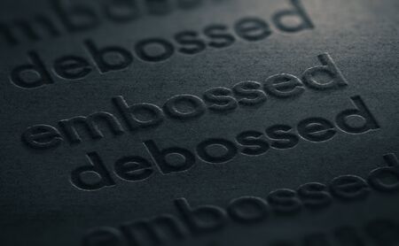 3D illustration of two words embossed and debossed impressed on a black paper texture.の写真素材