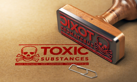 3D illustration of a rubber stamp with the text toxic substances stamped on paper backgroundの写真素材