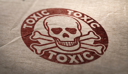 Toxic substances symbol over cardboard background. Composite image between a carboard photography...