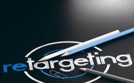 3D illustration of the word retargeting written with wooden pencils over black background.の写真素材