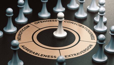 3d illustration of pawns over black background and a circle shape with 5 words around it representing the big five personality traits and the ocean model.  Psychology concept.の写真素材