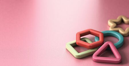 3D illustration of basic geometric shapes over pink background. Concept children educationの写真素材