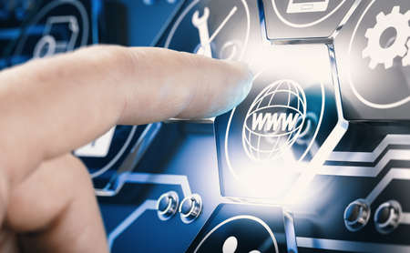 Hand pressing a digital button with www pictogram over blue background. Futuristic web technology concept. Composite image between a hand photography and a 3D background.の写真素材